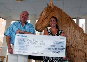 Howard presenting a Cheque to Alison of Gully's Place